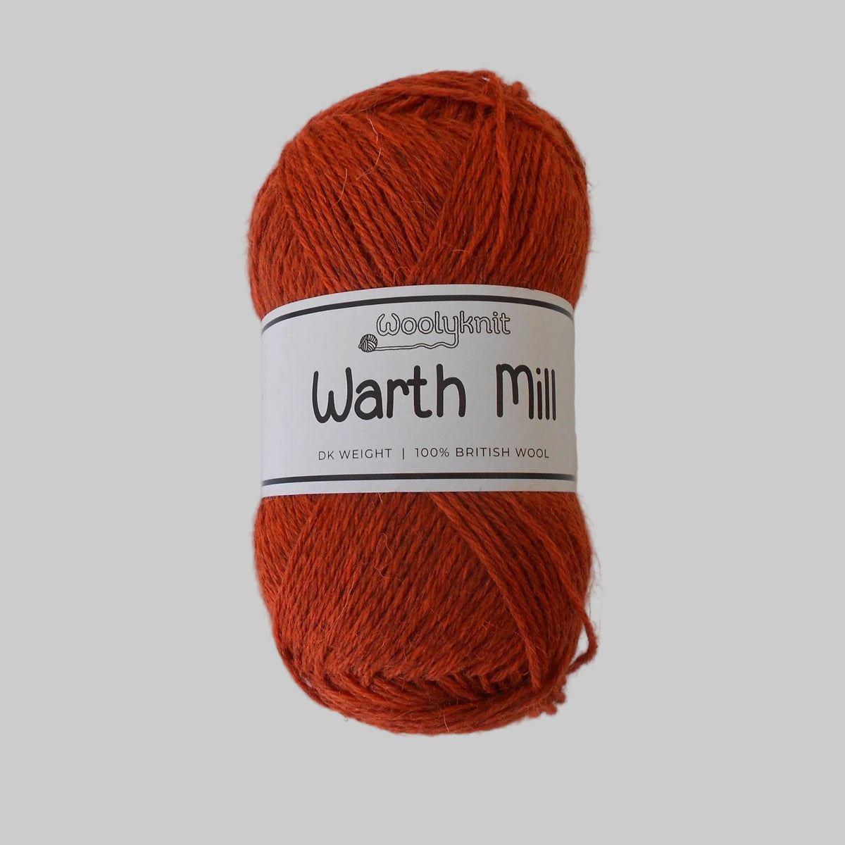A ball of burnt orange Woolyknit Warth Mill 100% British Wool in DK.